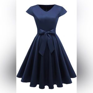 Blue 50’s style dress.